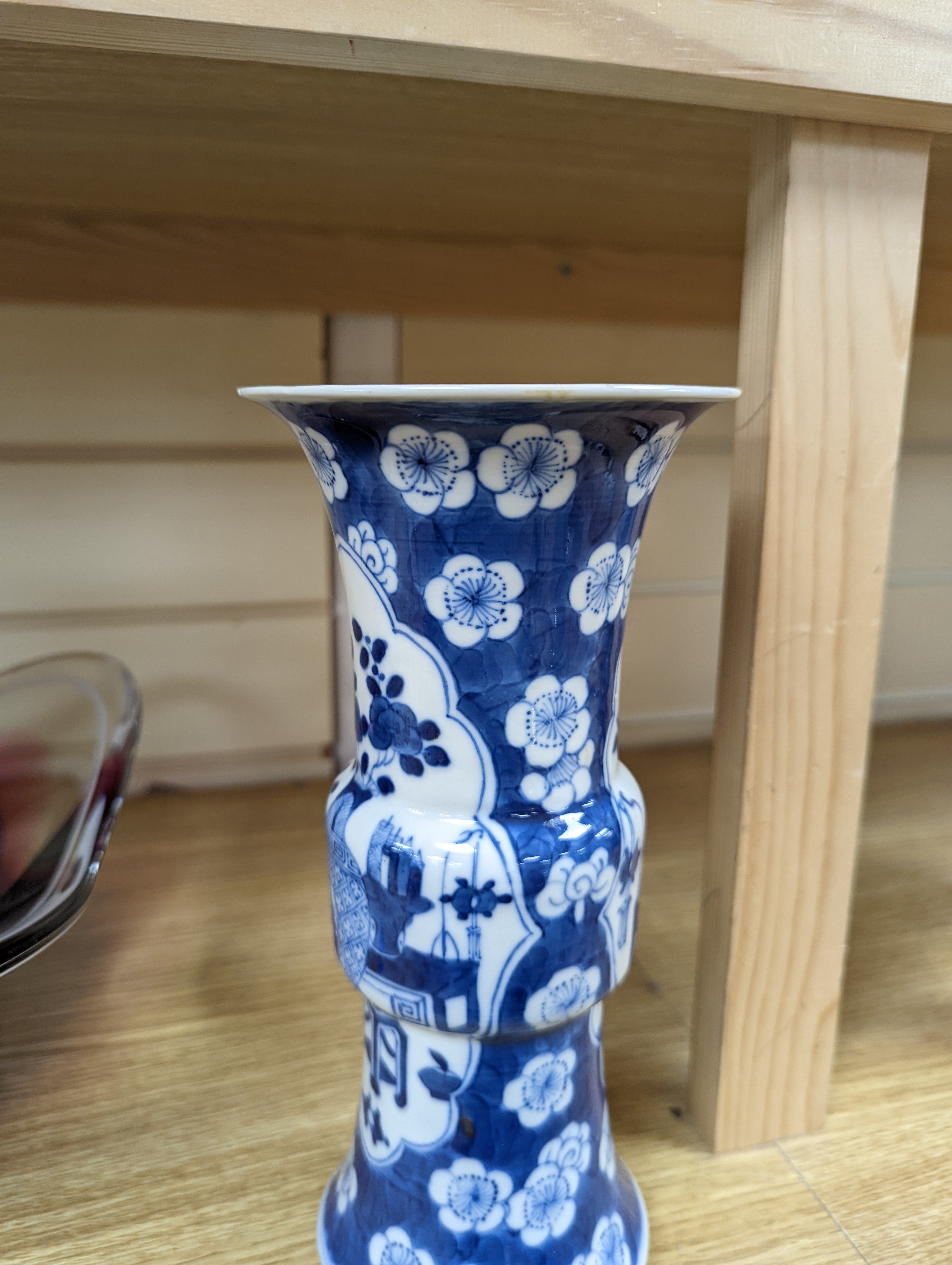 A 19th century Chinese blue and white prunus gu vase, 25 cms high.